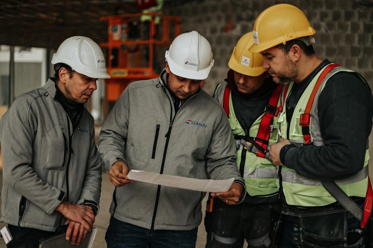 Team of workers checking a paper